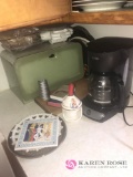 coffee maker/bread box-dishes/bowls/towels