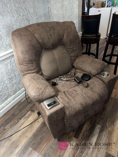 brown suede recliner with phone charger
