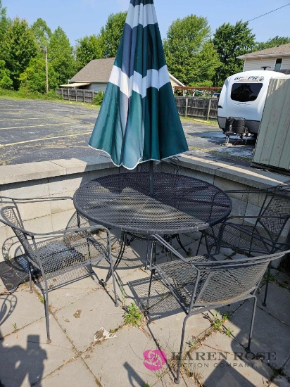 48 inch round patio table with four chairs and umbrella