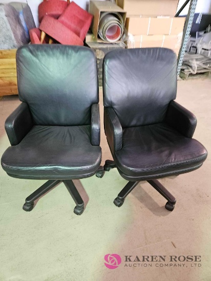 2 rolling office chairs