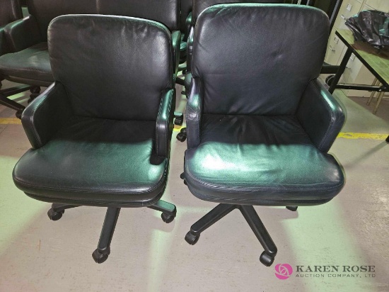 2 rolling office chairs