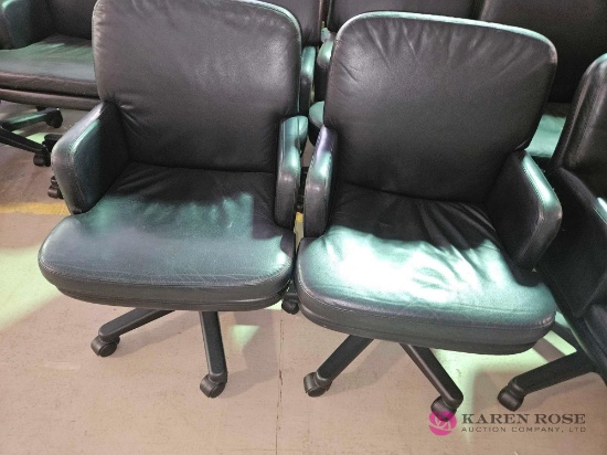 2 rolling office chairs