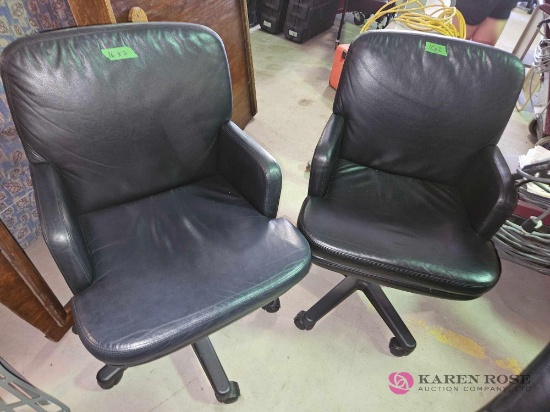 2 rolling office chairs