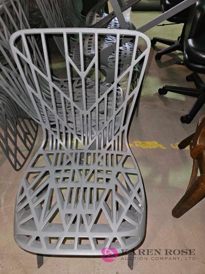 6 cast metal chairs