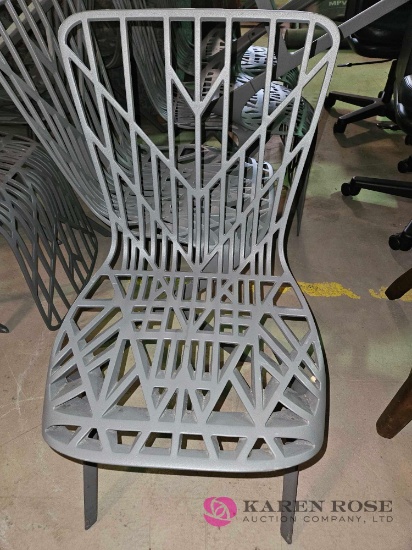 6 cast metal chairs