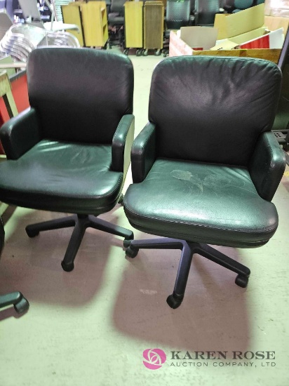 2 rolling office chairs