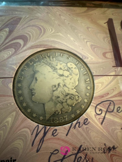 1887 Morgan silver dollar