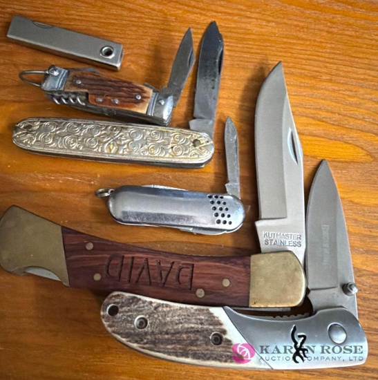 six assorted pocket knives