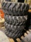 set of 4 NEW skid steer tires & wheels