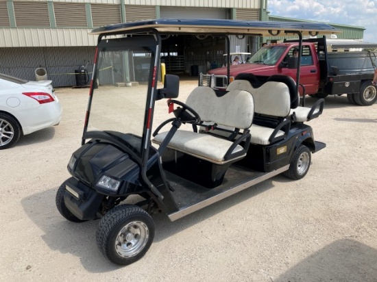 Black 6 seater golf car, built in charger
