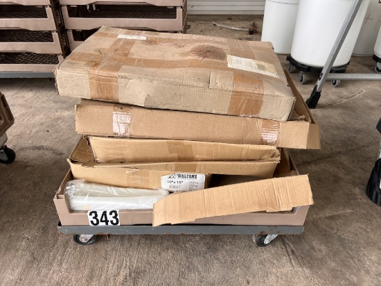 Rolling metal cart with cases of various size