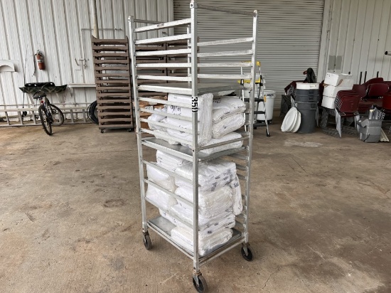 In load bun pan rack with packs of galley rags