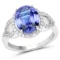 *14 kt. White Gold, 3.94CT Oval Cut Tanzanite And Diamond Ring