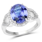 *14 kt. White Gold, 3.94CT Oval Cut Tanzanite And Diamond Ring