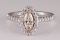 *Fine Jewelry 14 kt. Two Tone Gold, 0.42CT Marquise Cut Diamond And 0.61CT Round Cut Diamond  Ring