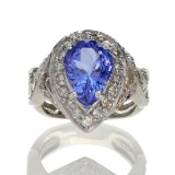 APP: 14.8k 14 kt. White Gold, 3.44CT Pear Cut Tanzanite And 1.50CT Round Cut Diamond Ring