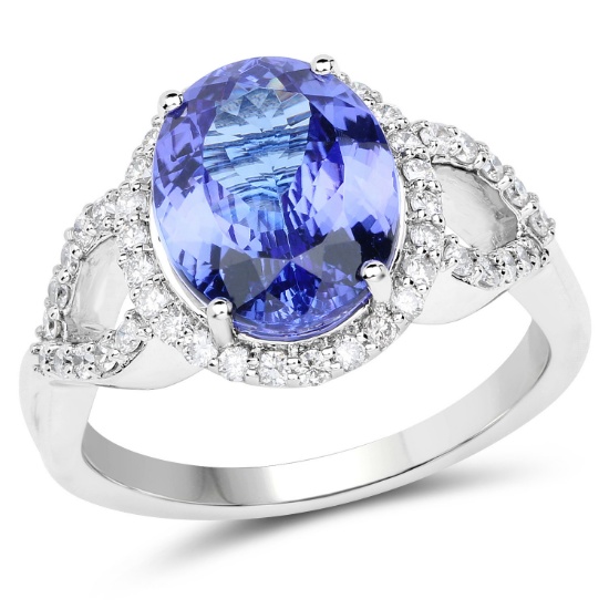 *14 kt. White Gold, 3.94CT Oval Cut Tanzanite And Diamond Ring