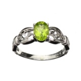 APP: 0.7k Fine Jewelry 0.85CT Oval Cut Green Peridot And Platinum Over Sterling Silver Ring