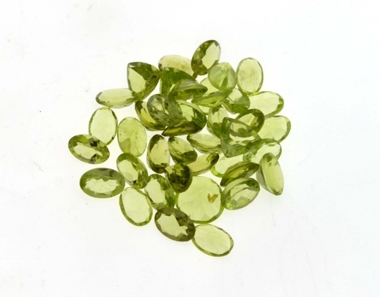 APP: 3k 20.00CT Oval Cut Green Peridot Parcel