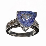 APP: 14.8k 14 kt. White Gold, 6.33CT Triangle Cut Tanzanite And 0.38CT Diamond Ring