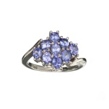 APP: 1.4k Fine Jewelry 1.50CT Oval Cut Tanzanite And Sterling Silver Cluster Ring