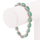 APP: 17k *18K 12.66ctw Emerald and 1.60ctw Diamond Silver Bracelet (Vault_R8_24230)