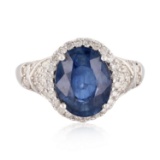 APP: 5k *4.79ct Blue Sapphire and 0.57ctw Diamond 14K White Gold Ring (Vault_R7_23540)