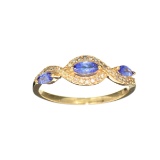 Designer Sebastian 14 KT Gold Marquise Cut Tanzanite and 0.10CT Round Brilliant Cut Diamond Ring