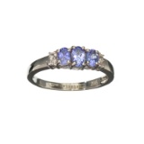 APP: 0.7k Fine Jewelry 0.70CT Oval Cut Tanzanite And White Sapphire Sterling Silver Ring