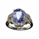APP: 7.1k 14 kt. White Gold, 2.75CT Oval Cut Tanzanite And 0.26CT Diamond Ring