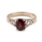 APP: 0.7k 14 kt. Gold, 1.60CT Oval Cut Garnet Ring