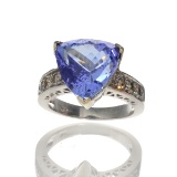 APP: 21k 14 kt. White Gold, 7.36CT Trillion Cut Tanzanite And 0.48CT Round Cut Diamond Ring