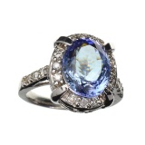 APP: 18.4k 14 KT. White Gold 5.85CT Oval Cut Tanzanite And 0.36CT Round Cut Diamond Ring