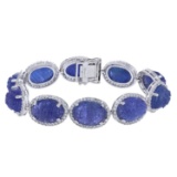 APP: 12.2k 75.00ctw Tanzanite and 3.10ctw White Topaz Silver Bracelet (Vault_R10_13856)