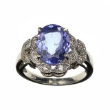 APP: 7.1k 14KT. White Gold, 2.75CT Oval Cut Tanzanite And 0.26CT Diamond Ring