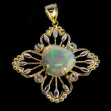 APP: 5k 14KT. Yellow and White Gold, 4.73CT Crystal Opal and Topaz Pendant
