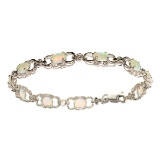 APP: 0.6k Fine Jewelry 12.00CT Oval Cut Cabochon White Opals And Sterling Silver Bracelet