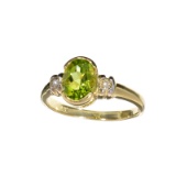 APP: 1k Fine Jewelry Designer Sebastian 14KT. Gold, 1.25CT Green Peridot And White Sapphire Ring