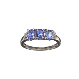 1.30CT Oval Cut Tanzanite  And White Sapphire Sterling Silver Ring