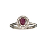 0.81CT Oval Cut Ruby And White Sapphire Sterling Silver Ring