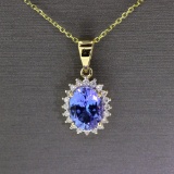 Tanzanite Oval Cut 1 Carat Center Stone Surrounded by Diamonds with Yellow Gold Chain! (Vault_Q)