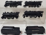 *6 LIONEL TRAINS