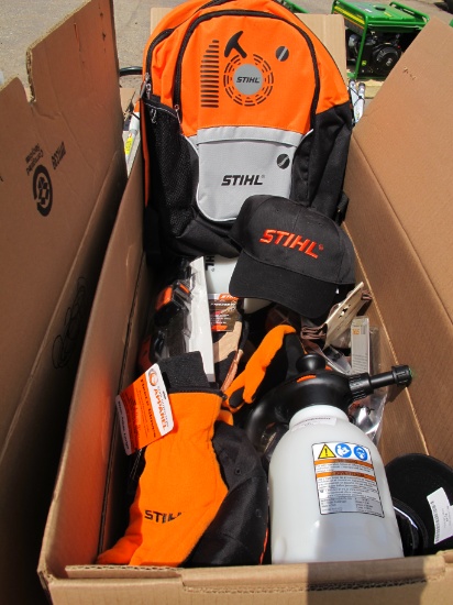 One large box of Stihl excessories;including gloves, knives, saws, hats