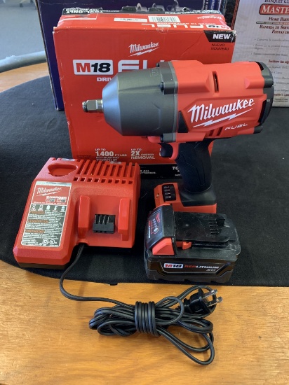 New Milwaukee Fuel 1/2 inch 1400 pound impact with 3.0 Battery and charger