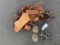 Spurs, Belt buckles, bundle of leather pieces