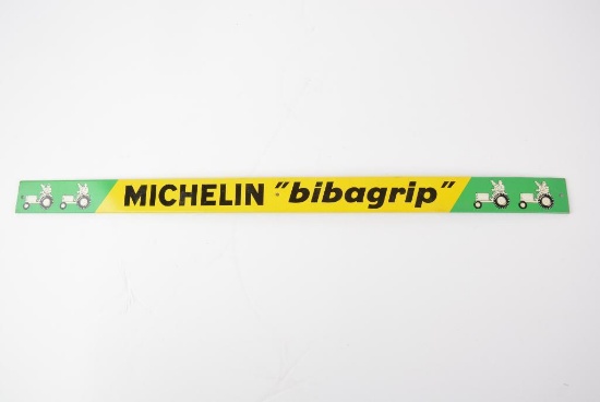 Michelin "bibagrip" (farm tires) w/Bibendum Riding a Tractor metal strip sign (TAC)