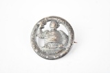 (Michelin) With Bibendum Compliments metal brooch