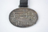 Russell Grader MFG. Company Metal Watch Fob