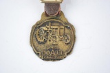Rumely Doall Tractor Company Metal Watch Fob