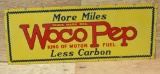 Woco Pep Less Carbon Porcelain Sign